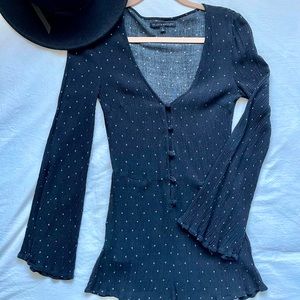 Erin Watson Black Romper with White Dot Detailing